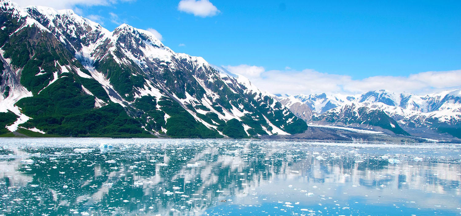 Alaska Yacht Charter still water and snow covered mountains